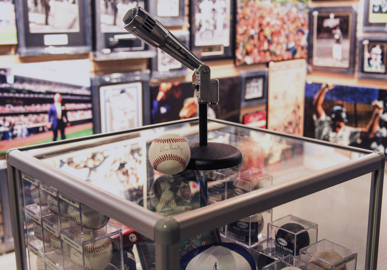 A Vin Scully microphone and signed baseball.